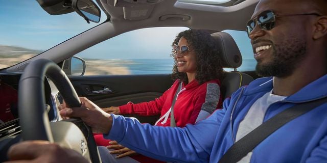 Photo of people smiling in a 2024 Chevrolet Trax