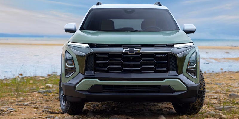 Front view of a 2025 Chevrolet Equinox parked by a body of water