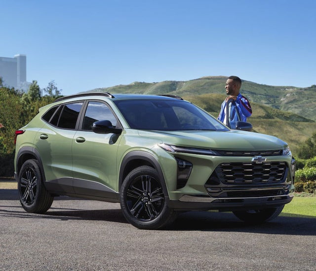 Group of Friends Approaching a 2025 Chevy Trax